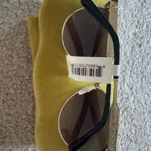 Gucci Black Sunglasses with Modern Semi-Rimless Design Gucci GG1221S Sunglasses | FREE Shipping - Go-Optic.com main image 4